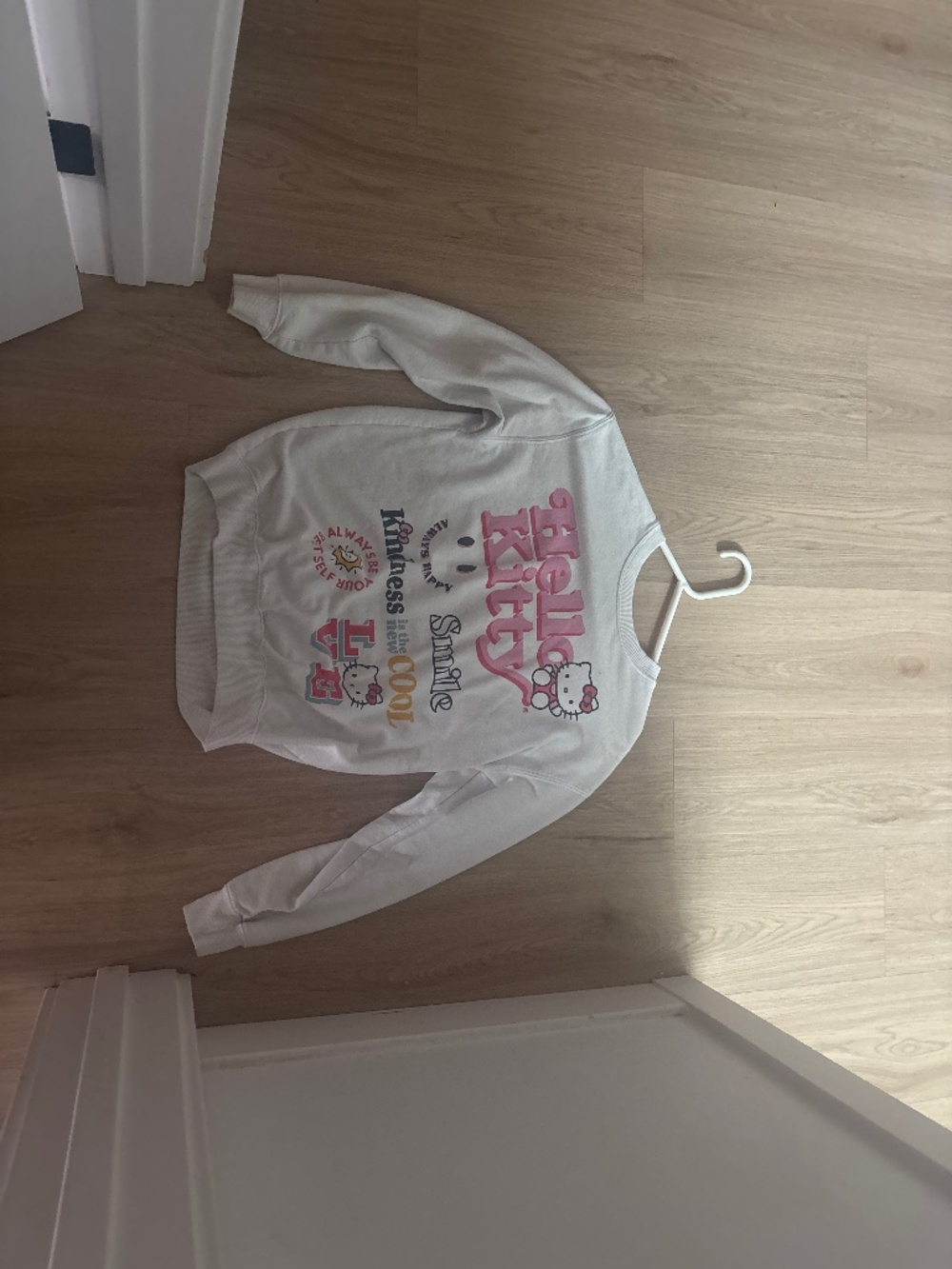 white hello kitty sweater